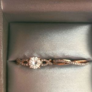 White Sapphire with diamonds in Rose Gold Engagement ring.